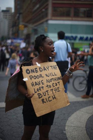 “One Day the Poor Will Have Nothing Left to Eat But the Rich”, Occupy Wall Street, New York, October 2011.