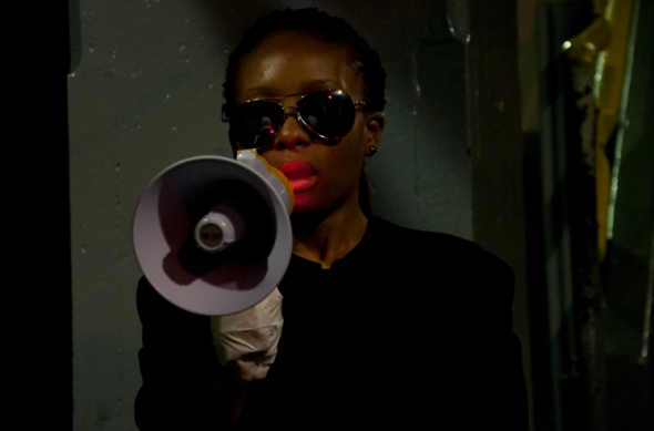 Courtesy of the Artist,Akona Kenqu, Public Acts, Johannesburg, 2014, Performance Tedet Time (From Compound to City)