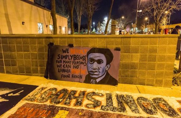 Fanon Banner outside the Minneapolis Police Department fourth precinct following the officer-involved shooting of Jamar Clark on November 15, 2015. Photo Tony Webster 