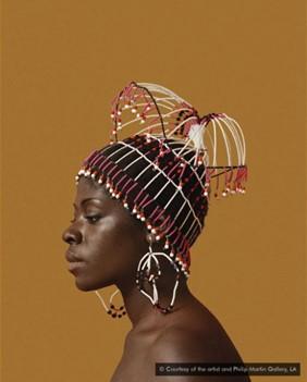 This portrait of the photographer’s wife, Sikolo Brathwaite, is displayed at the Black is Beautiful exhibition