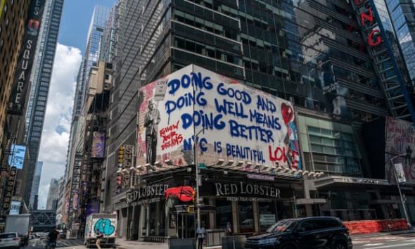 Mr. Brainwash art on billboards at Times Square. Photograph Lev Radin, Pacific Press, REX, Shutterstock