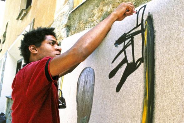 Portrait of Jean-Michel Basquiat in St. Moritz, Switzerland, 1983. Photo by Lee Jaffe/Getty Images.