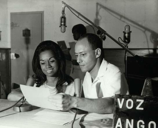 At the radio microphones in Angola, with the presenter José Guize